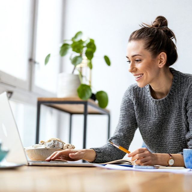 Woman on laptop working. Trying to find a wellbeing directory that matches who you are is challenging. Telehub wellness has a directory work wellness professionals. Whether you're in California, Colorado, Texas, or anywhere in the U,S, This online wellness directory could be a great fit!